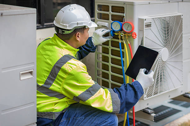 Professional Hvac technician working in Forestdale, AL